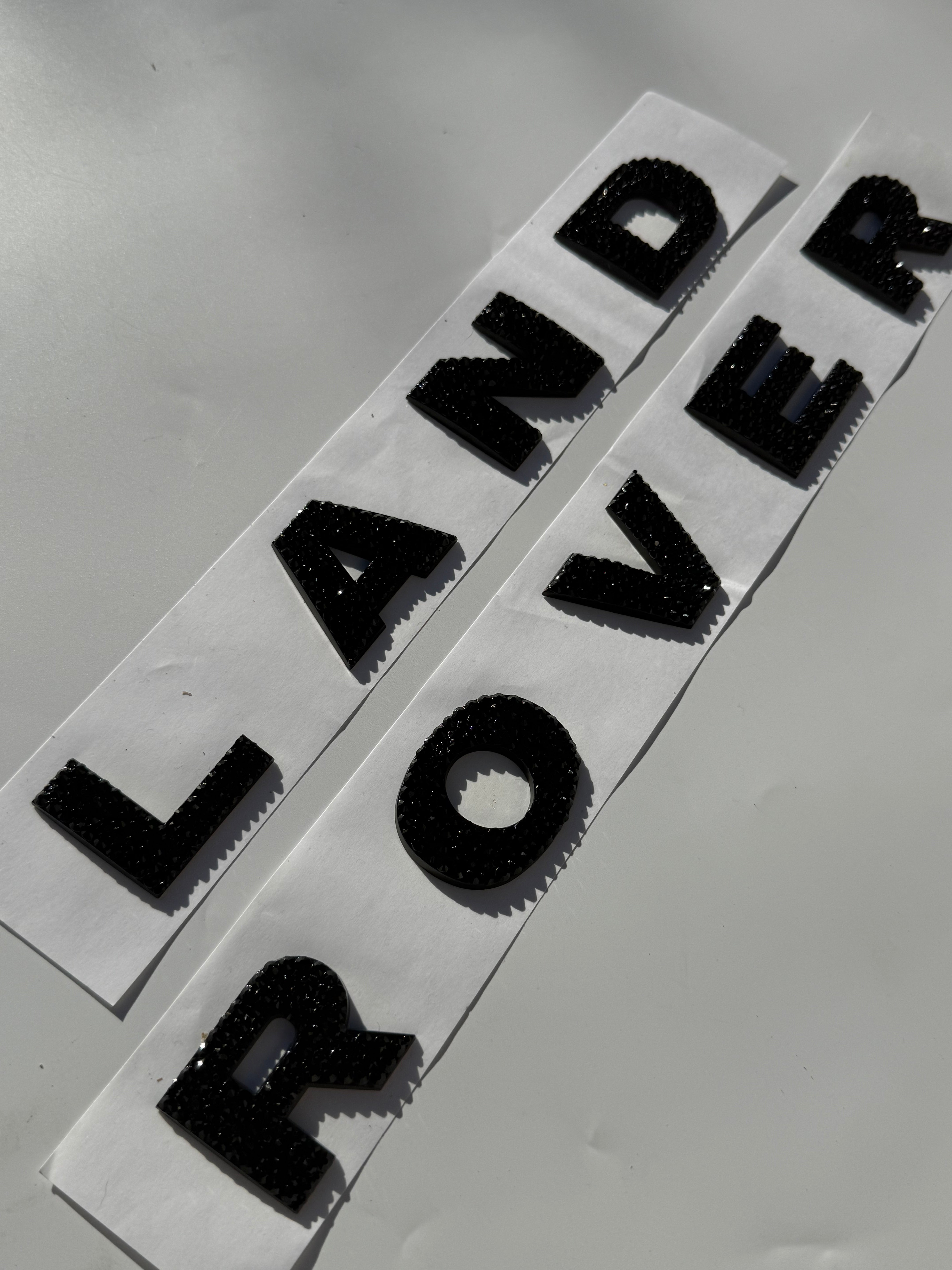 Premade Land Rover Crystal Letters In Jet Black — Genuine Replacement Emblem Crystallized With Premium Glass Rhinestones