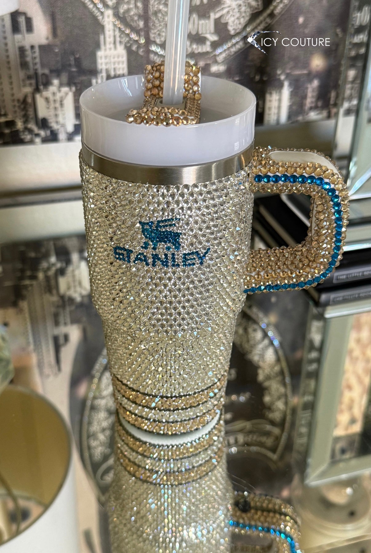 CRYSTALLIZED STANLEY TUMBLER  CUP WITH MEDELITE LOGO FEATURING CLEAR RHINESTONES WITH BLACK DIAMOND WITH SAPPHIRE LOGO AND GOLDEN ACCENTS