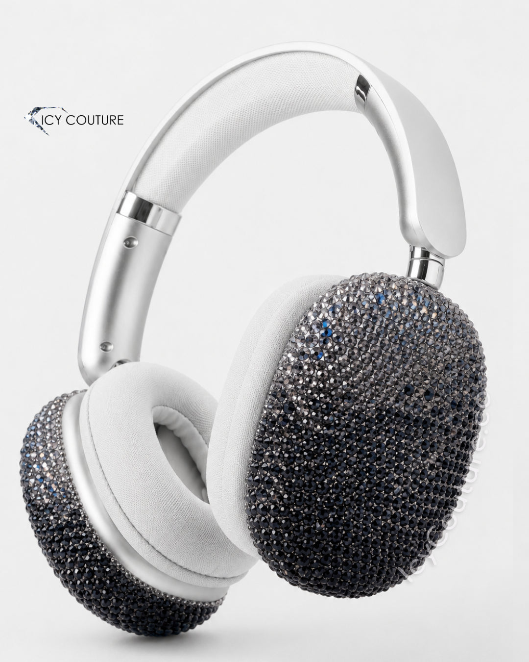 White Apple AirPods Max headphones with black diamond ombre crystal ear covers, hand-crystallized by ICY Couture for luxury custom headphones and high-end bling gifting.