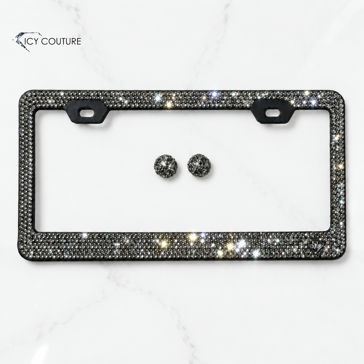 Custom crystal license plate frame in Black Diamond (silver) crystals on black metal frame by ICY Couture, a luxury car gift and personalized automotive accessory.
