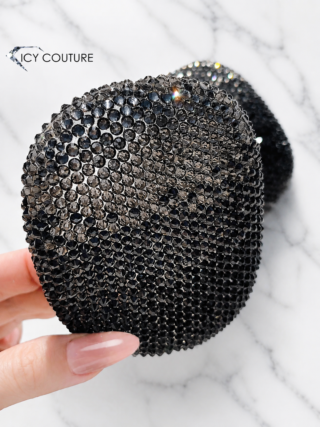 Black Diamond ombre crystal ear covers for Apple AirPods Max, hand-crystallized by ICY Couture for luxury custom headphones and high-end bling gifting.