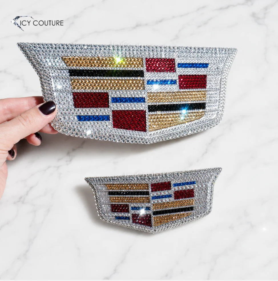 Crystal Cadillac Emblems Set, front and back replacement parts, crystallized in classic logo colors with Swarovski crystals for luxury car makeover for new Cadillac owners by ICY Couture