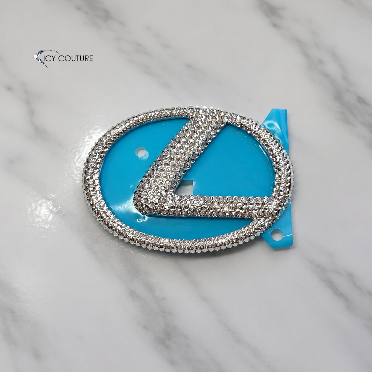 Custom crystal Lexus emblem by ICY Couture featuring hand-crystallized  Clear Rhinestones for new Lexus owners for luxury automotive customization.