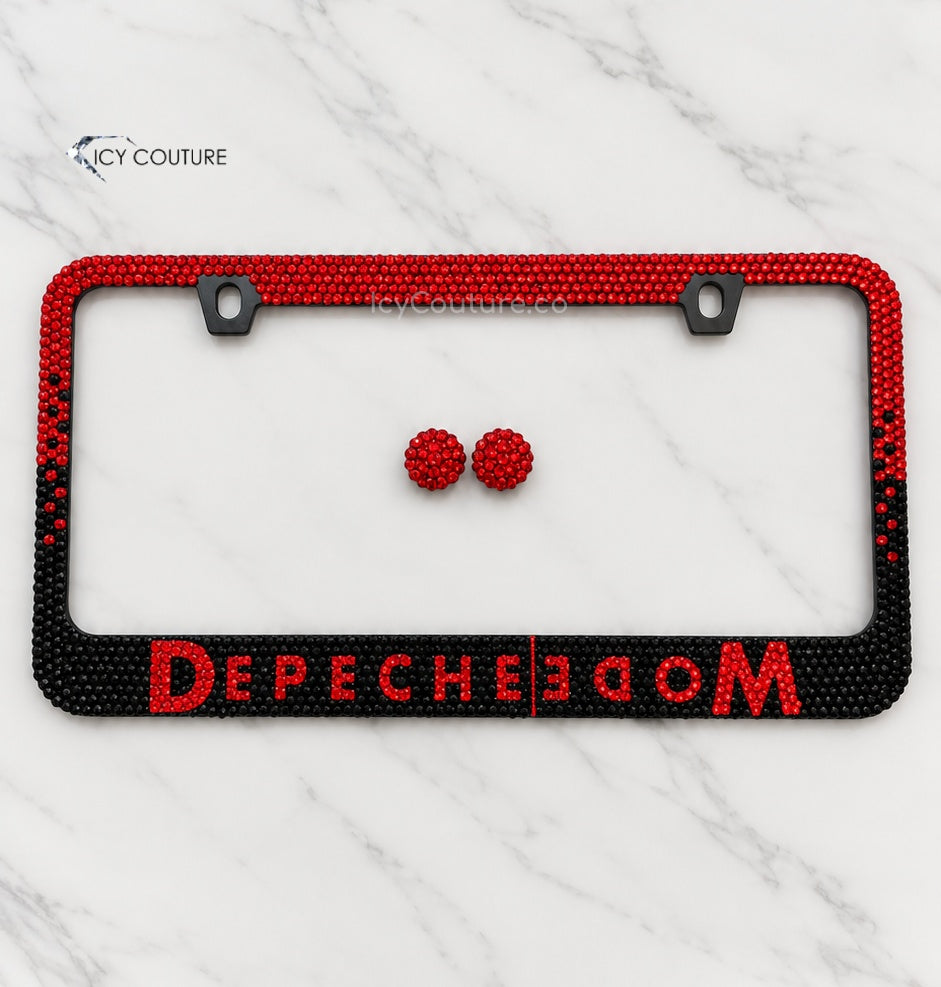 Red and black custom crystal license plate frame with mirrored Depeche Mode lettering and matching red rhinestone screw caps by ICY Couture, a luxury car gift for music fans.