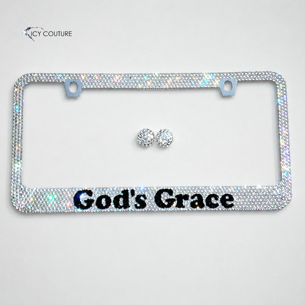 Personalized crystal license plate frame by ICY Couture with God’s Grace message, hand-applied clear rhinestones, black crystal lettering, and matching bling screw caps.