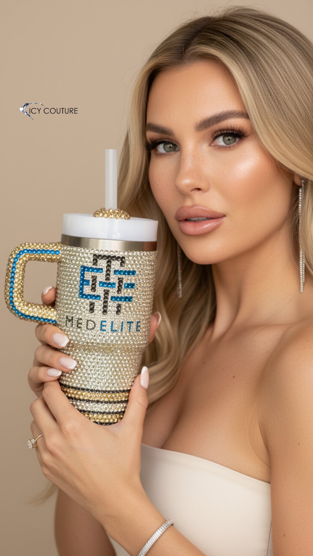Model holding custom crystal stanley tumbler cup with medelite logo crystallized by Icy Couture for luxury gifting, PR and brands activations  