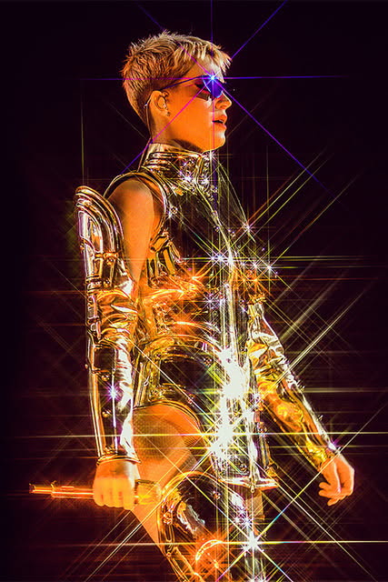 Gold-plated looking metallic stage costume by ICY Couture