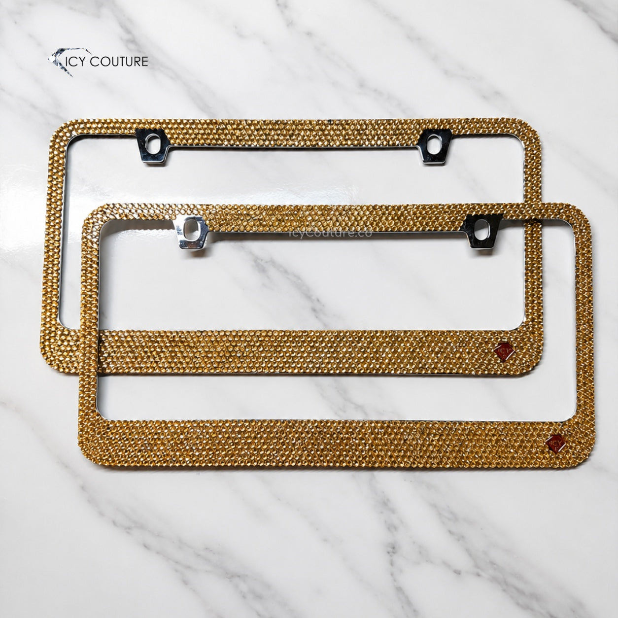 Ready-to-ship gold crystal license plate frame by ICY Couture, hand-crystallized with Golden Shadow Swarovski Crystals for a warm champagne-gold luxury car jewelry look.
