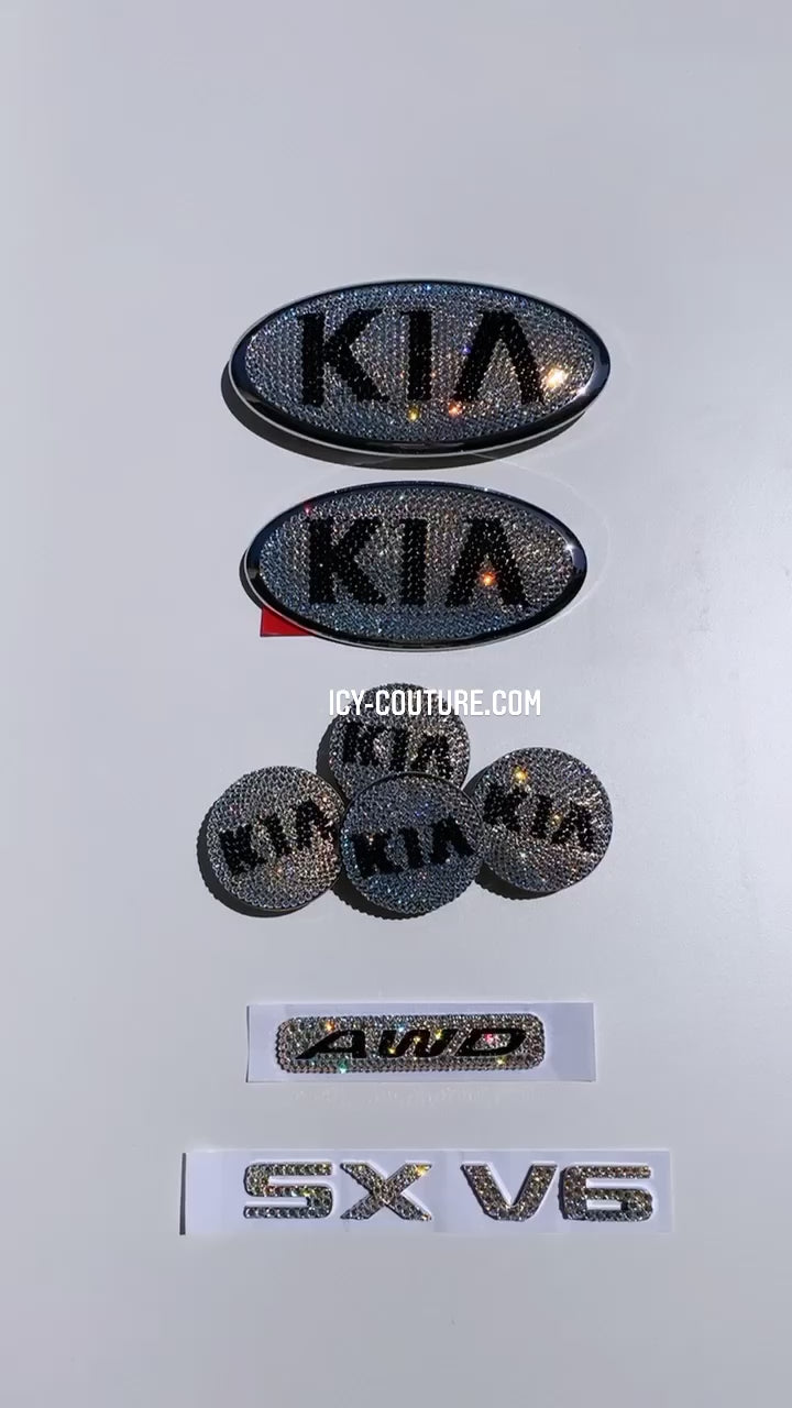 Watch Fascinating Video of Sparkling in Crystal Shimmer KIA Emblems Set which includes: front and back Crystal KIA emblems, matching bling KIA Center Wheel Rim Caps, crystallized AWD Badge and SX V6 letters, customized with Swarovski Crystals by ICY Couture.