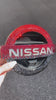 Video of Bedazzled Nissan Emblem with red to black ombre Swarovski crystals