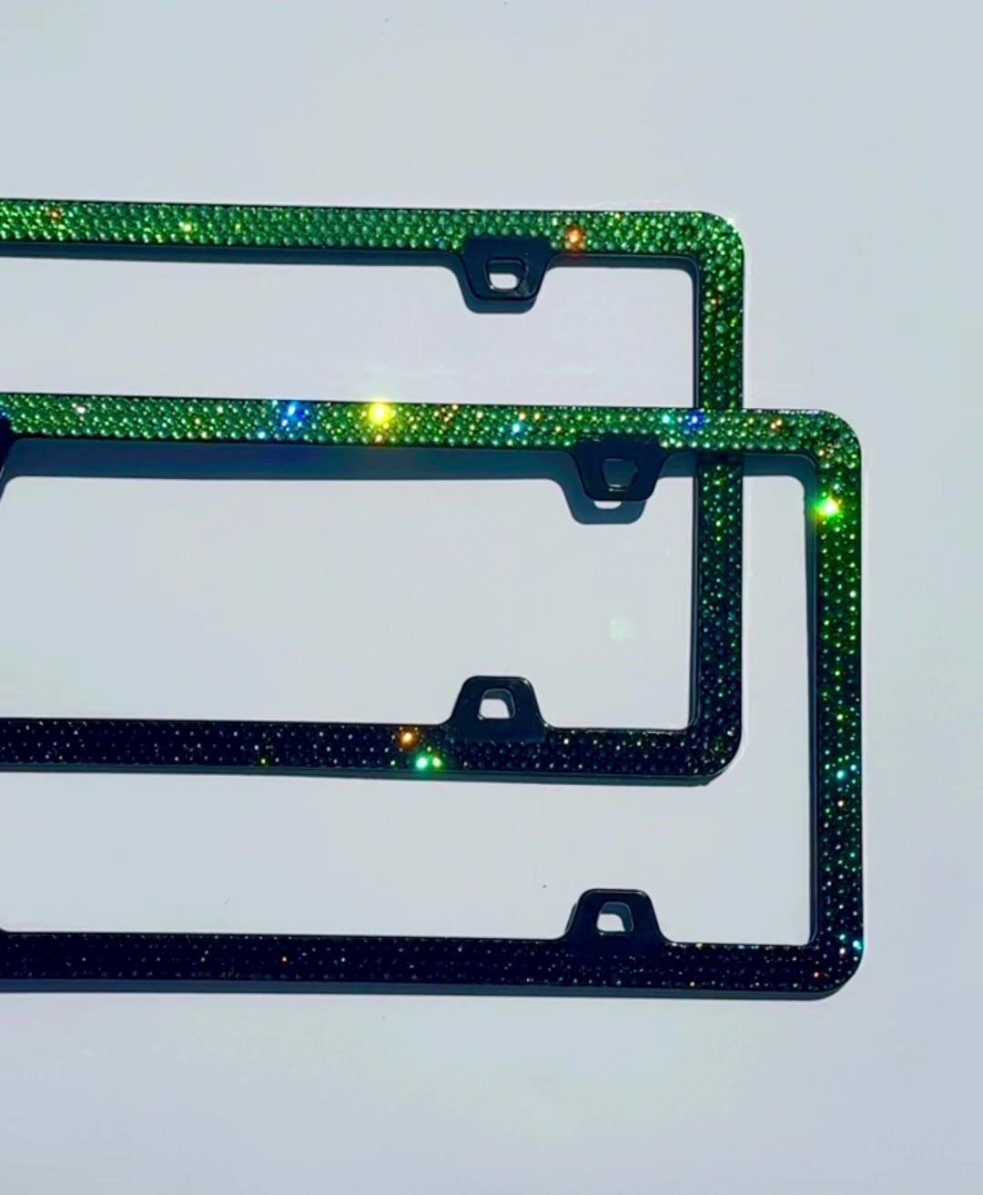 Video of Crystal License Plate Frames with 4 screw holes crystallized in Vertical Ombre with Swarovski Crystals Peridot, Fern Green, Emerald, Graphite. 