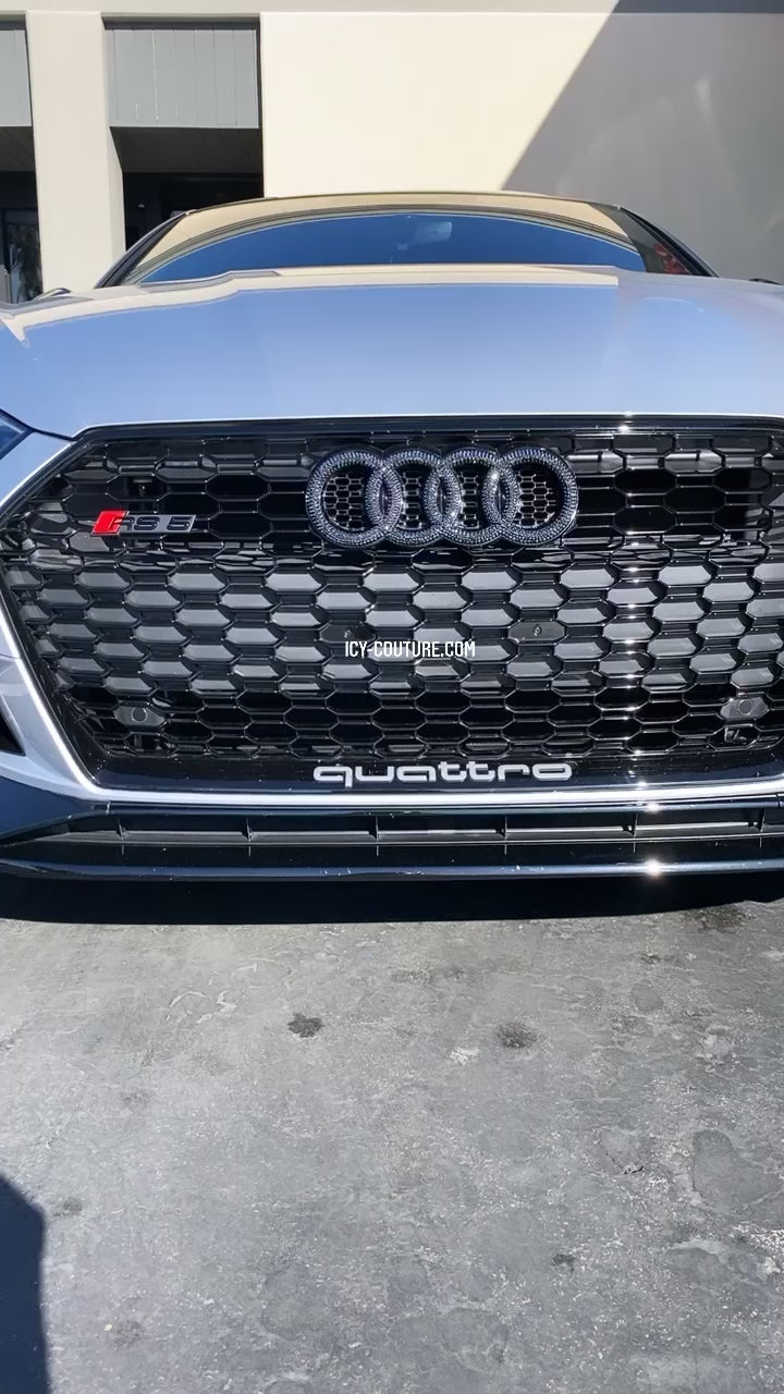Watch Video of Replacement Audi Bling Emblem, Glittering in Jet Hematite Crystals, Perfectly Adorning the Grille of Your Sporty Audi.