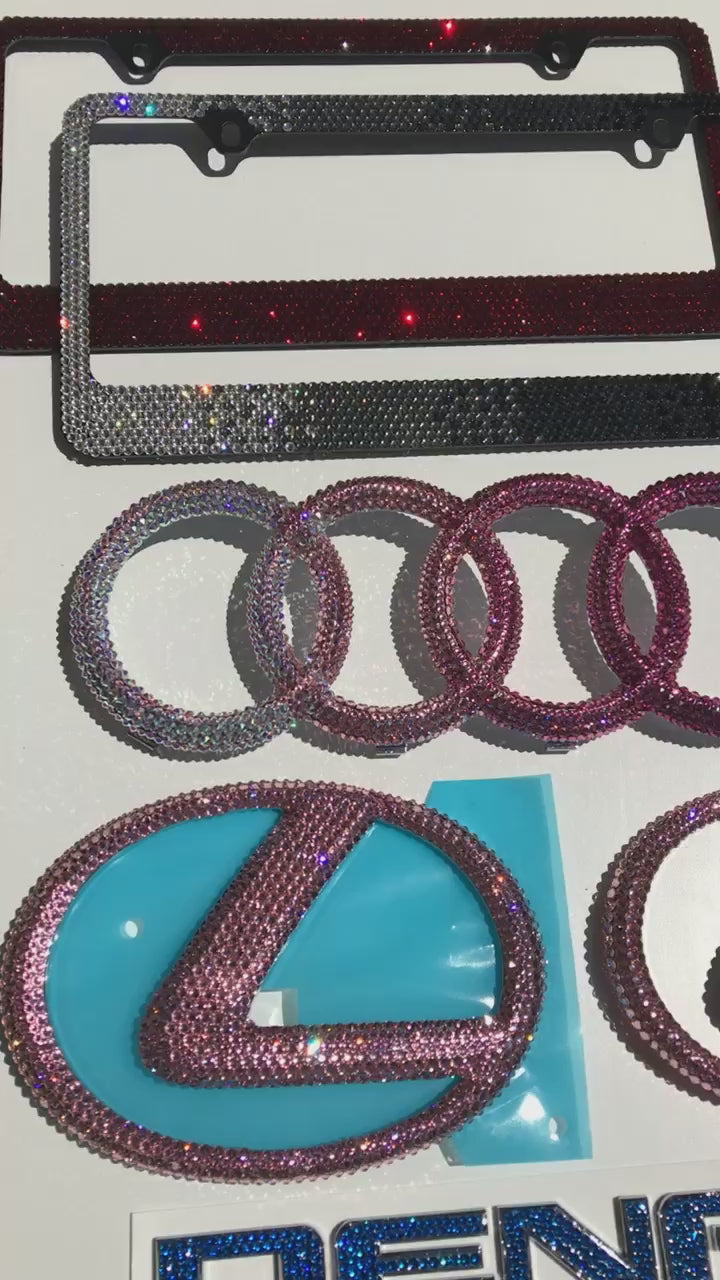 Video of emblems for lexus, audi, denali with matching bling license plate frames bedazzled by icy couture with swarovski crystals