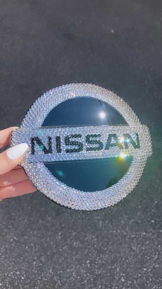 Watch Captivating Video of Sparkling in Diamond Clear Crystals Nissan Replacement Emblem, Crystallized by ICY Couture.