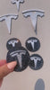 Watch video of gorgeous crystal Tesla emblems set that includes front. back and steering wheel emblems and matching crystal Tesla center wheel rim caps, crystallized by ICY Couture.