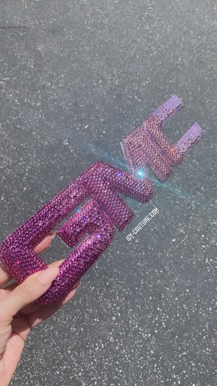 Video of Pink GMC tailgate back emblem 