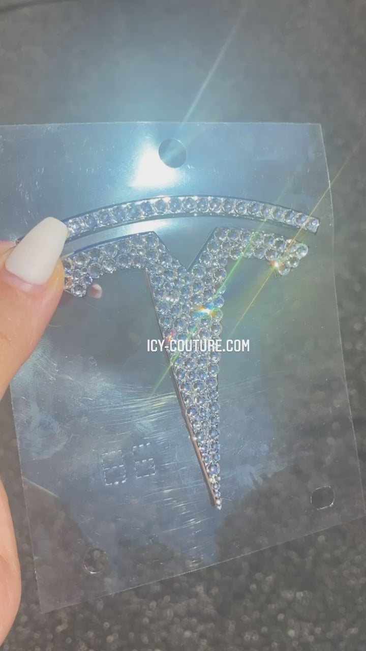 Watch video of Sparkling in Diamond Clear Crystals Tesla Emblem , Crystallized by ICY Couture.