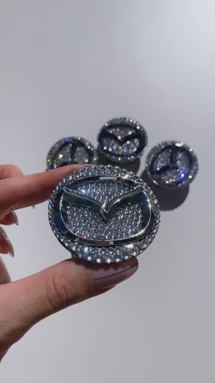 Watch video of sparkling Mazda center wheel rim caps in diamond Clear Swarovski Crystals, custom crystallized by ICY Couture.