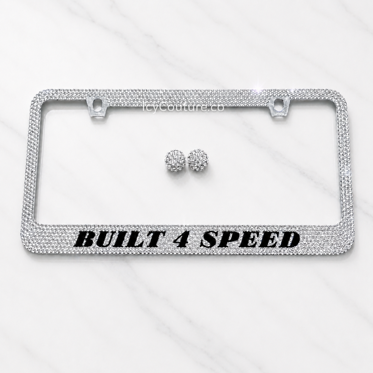 Custom Built 4 Speed crystal license plate frame with clear rhinestones and matching screw caps by ICY Couture for new car owners luxury sport's car gifting.