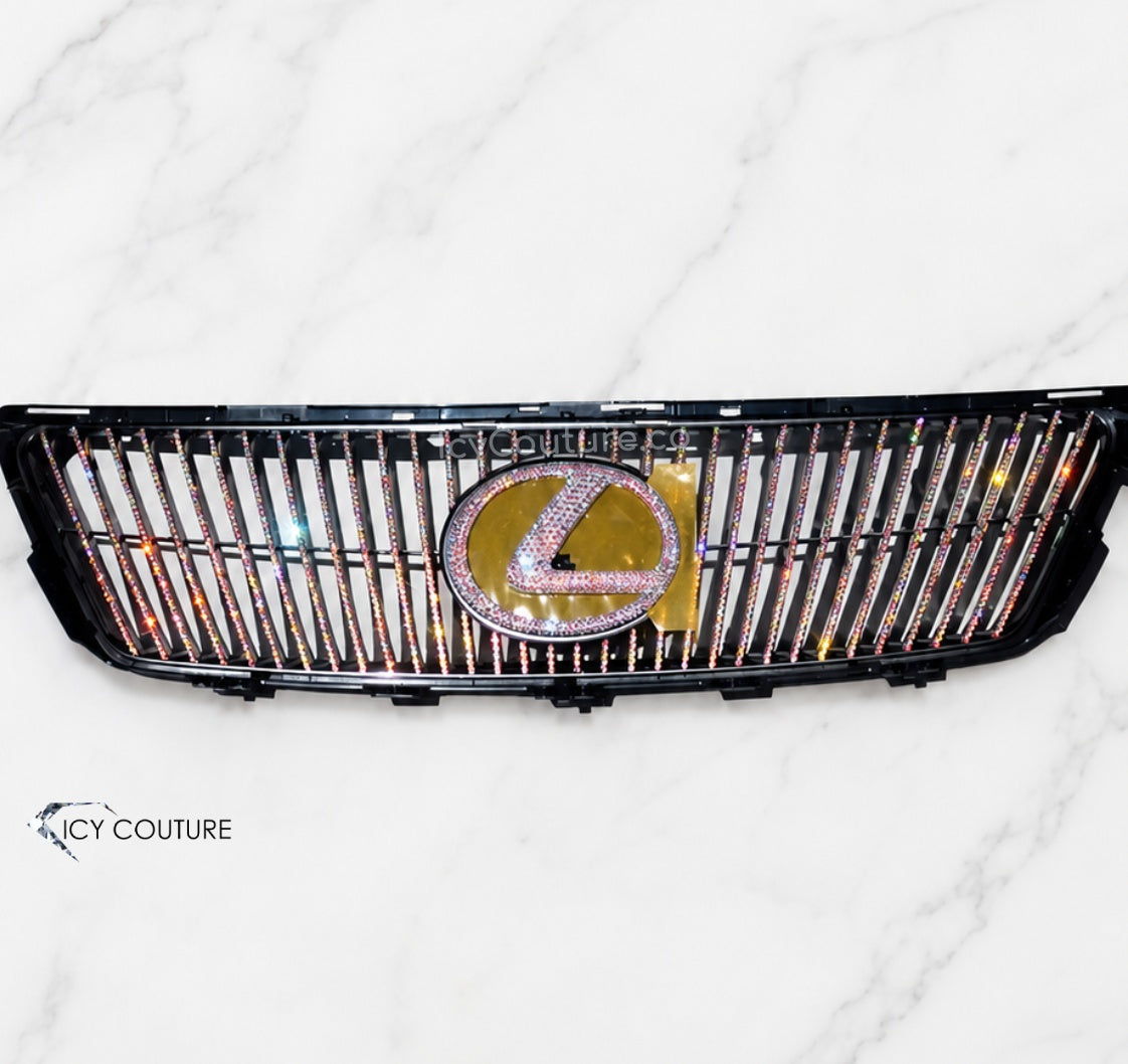 Custom crystal Lexus grille by ICY Couture with AB Swarovski crystals and a crystallized Lexus emblem on a black grille insert for luxury car customization.