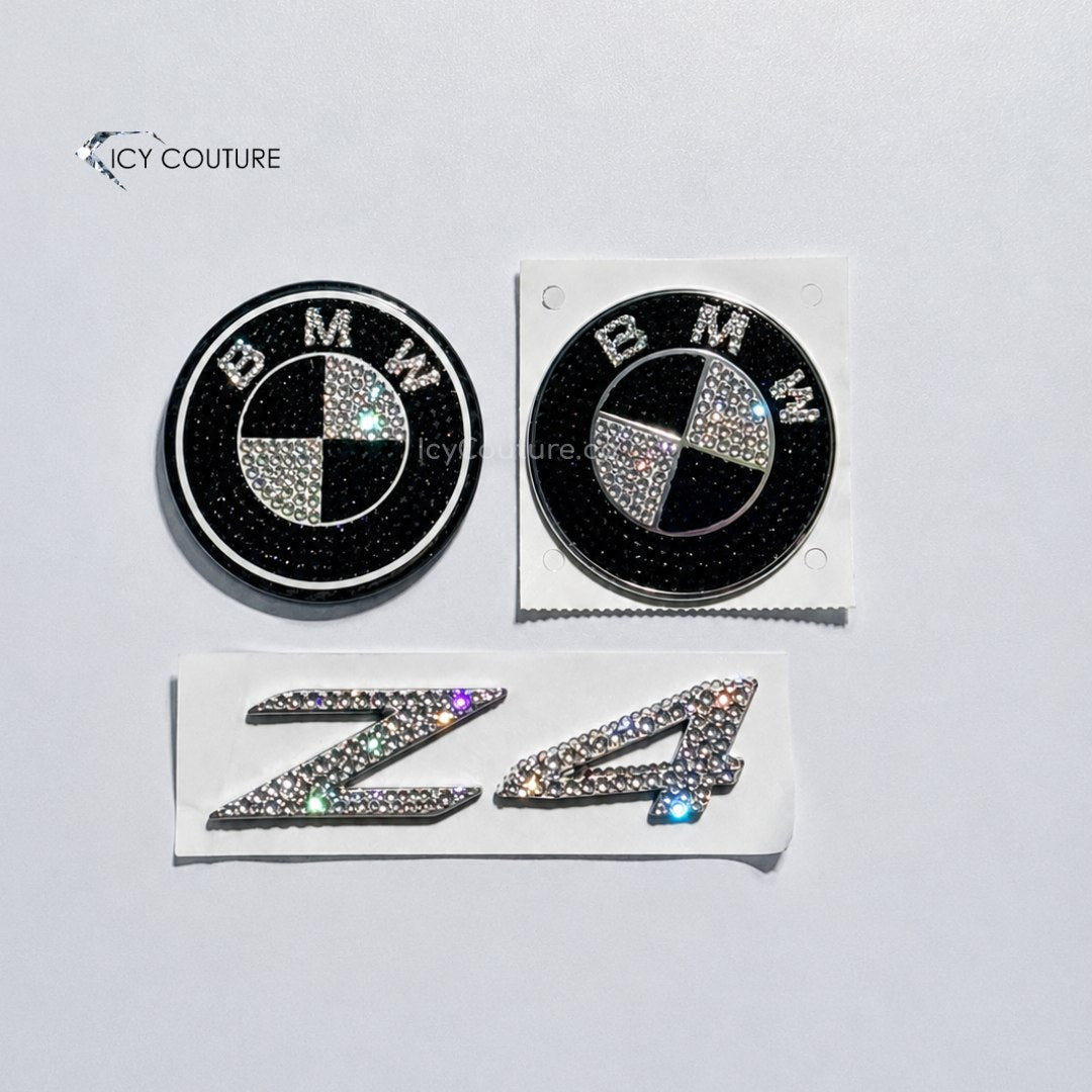 A set of BMW Z5 emblems crystallized with black and white rhinestones for luxury car customization for new BMW owners by ICY Couture