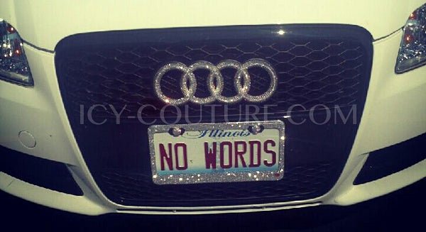 Super sparkling Diamond Clear Audi Grille Emblem with matching diamond bling license plate frame bedazzled by ICY Couture.