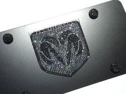 Close up on Dodge Ram Logo crystallized on black license plate with Swarovski crystals 